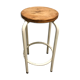 Vintage bar stool in white lace-up, round wooden seat rests circular feet