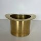 Champagne cooler shaped like a brass top hat.