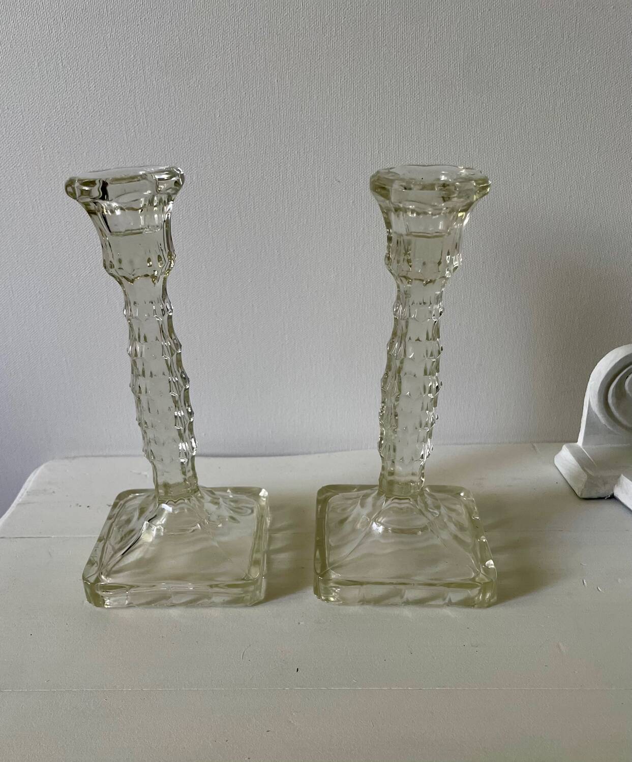 Pair of molded glass candlesticks