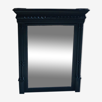 Trumeau with beveled mirror - ornamented black wood frame - nineteenth century