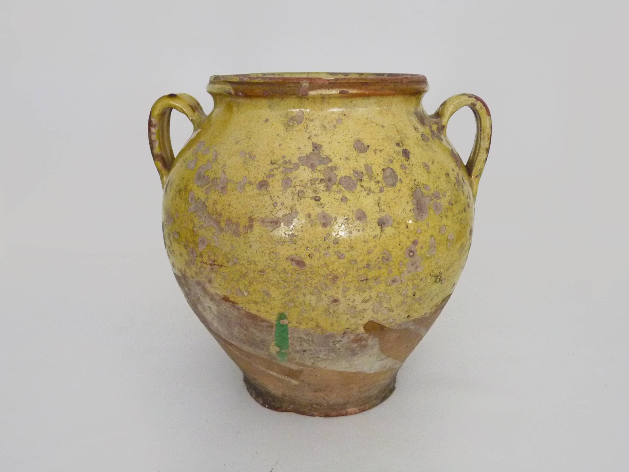 Magnificent glazed yellow confit pot, south-west of France. 19th century.
