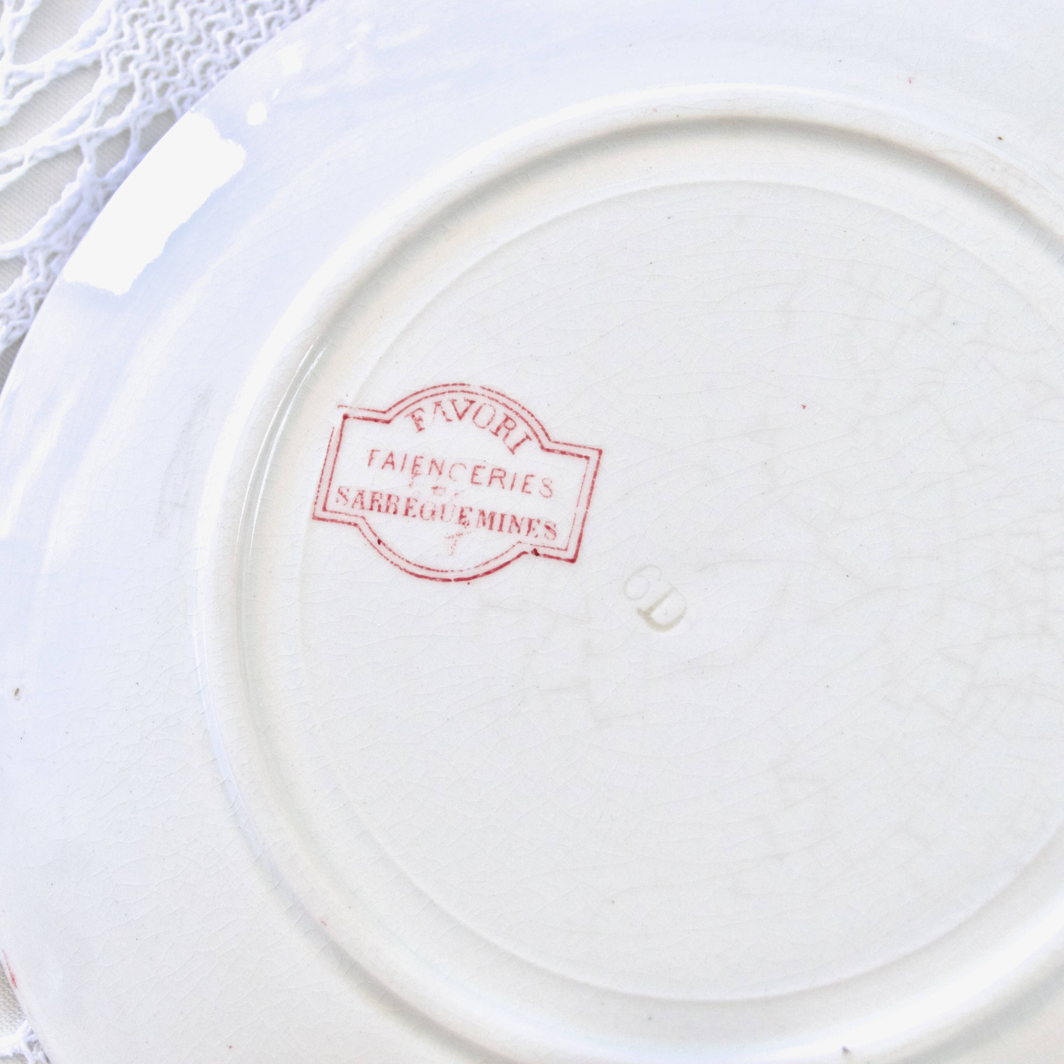 19th century Sarreguemines "Favori" plate in pink iron earth