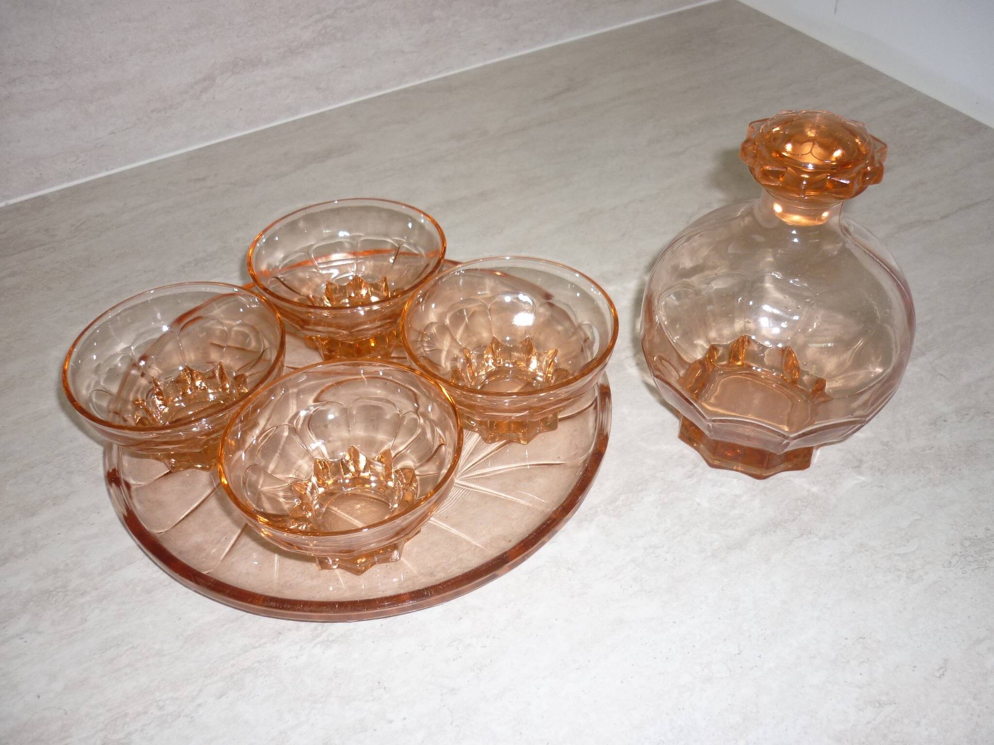 Art deco liqueur service in pink transparent glass with stopper
