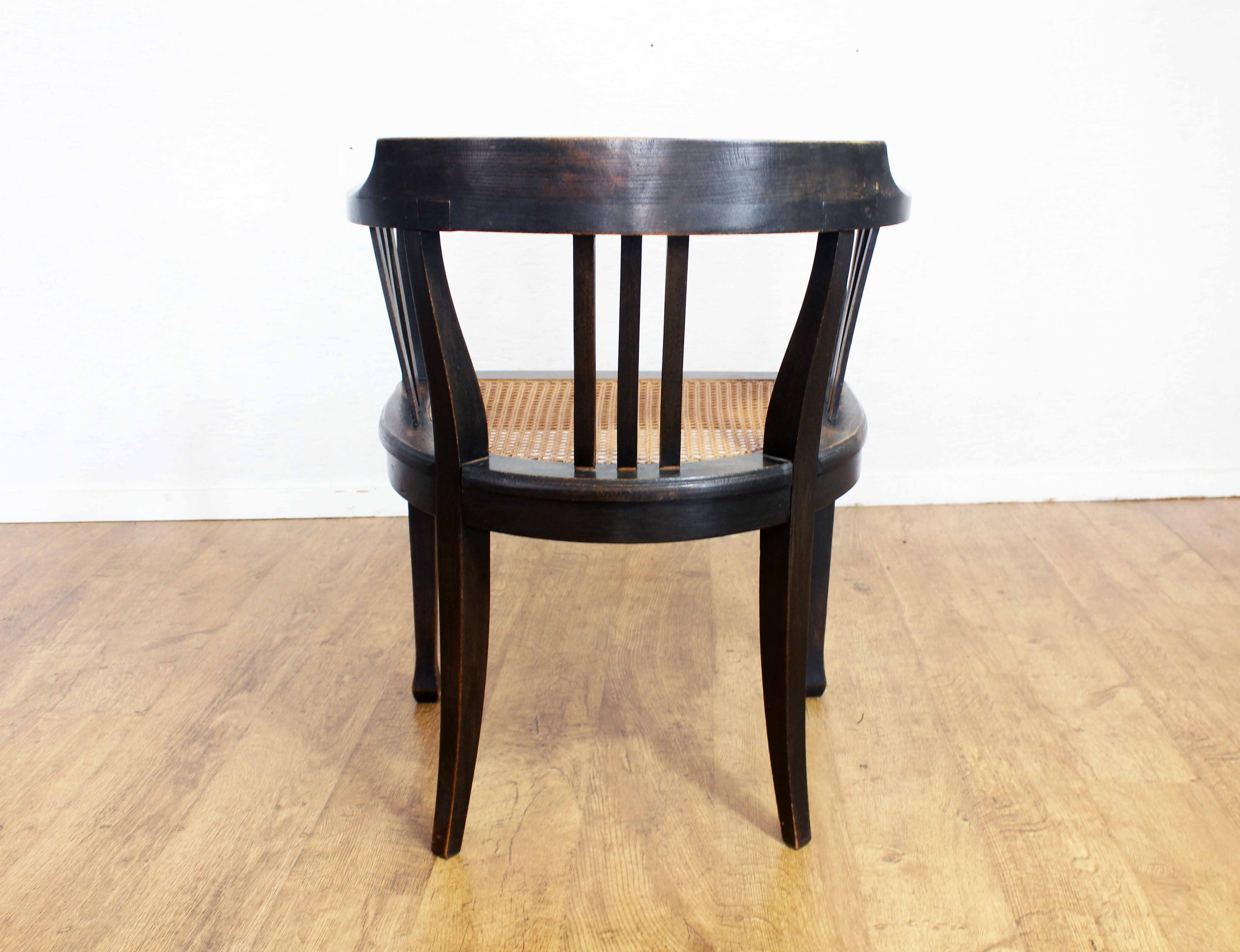 Old chair made of solid wood and caning