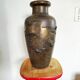 Large Art Deco vase in patinated brass, relief decoration of birds – year