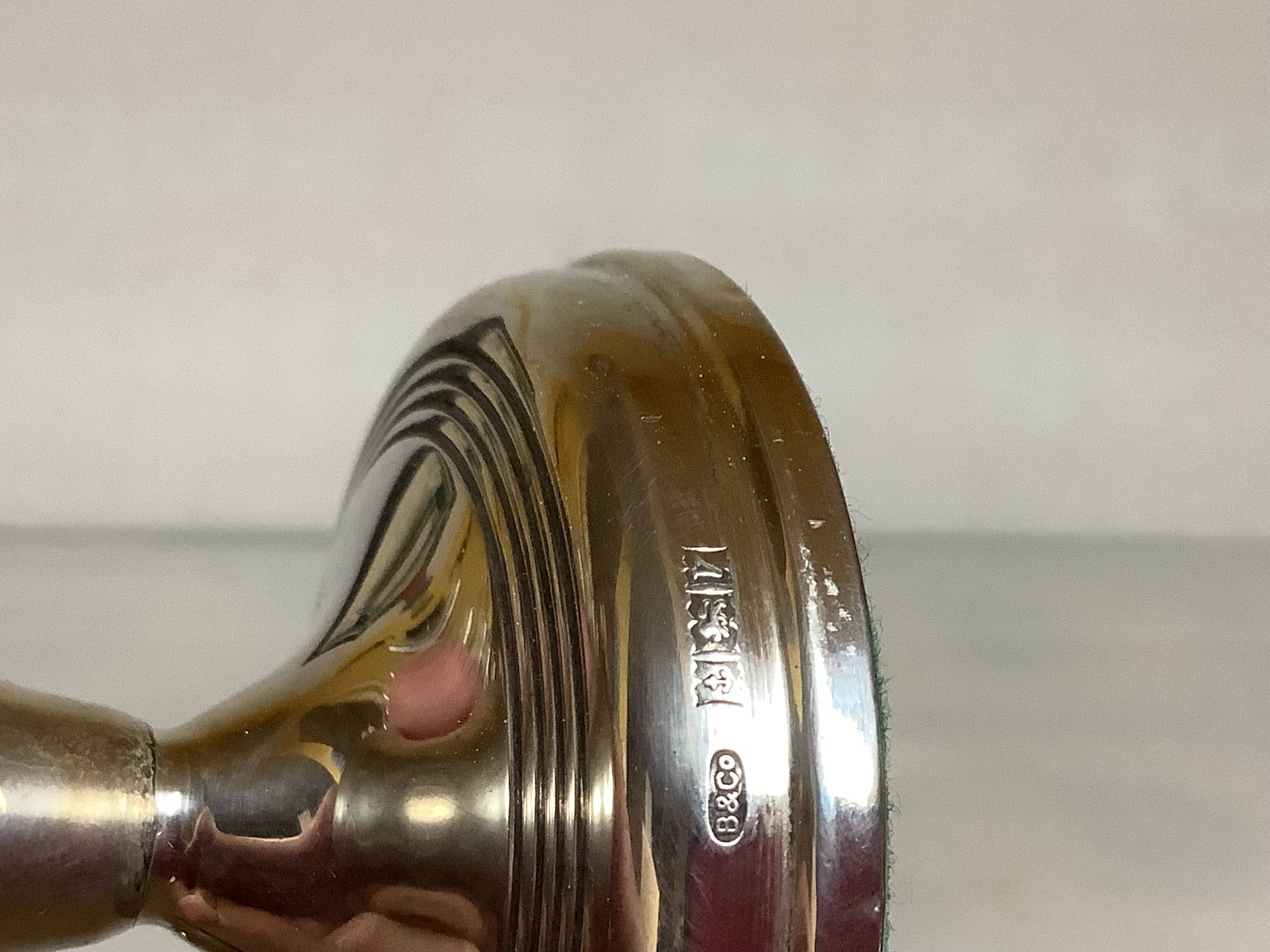 Pair of small silver candlesticks with hallmarks