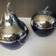 A pair of vintage cobalt glass and silver-plated sugar bowls.
