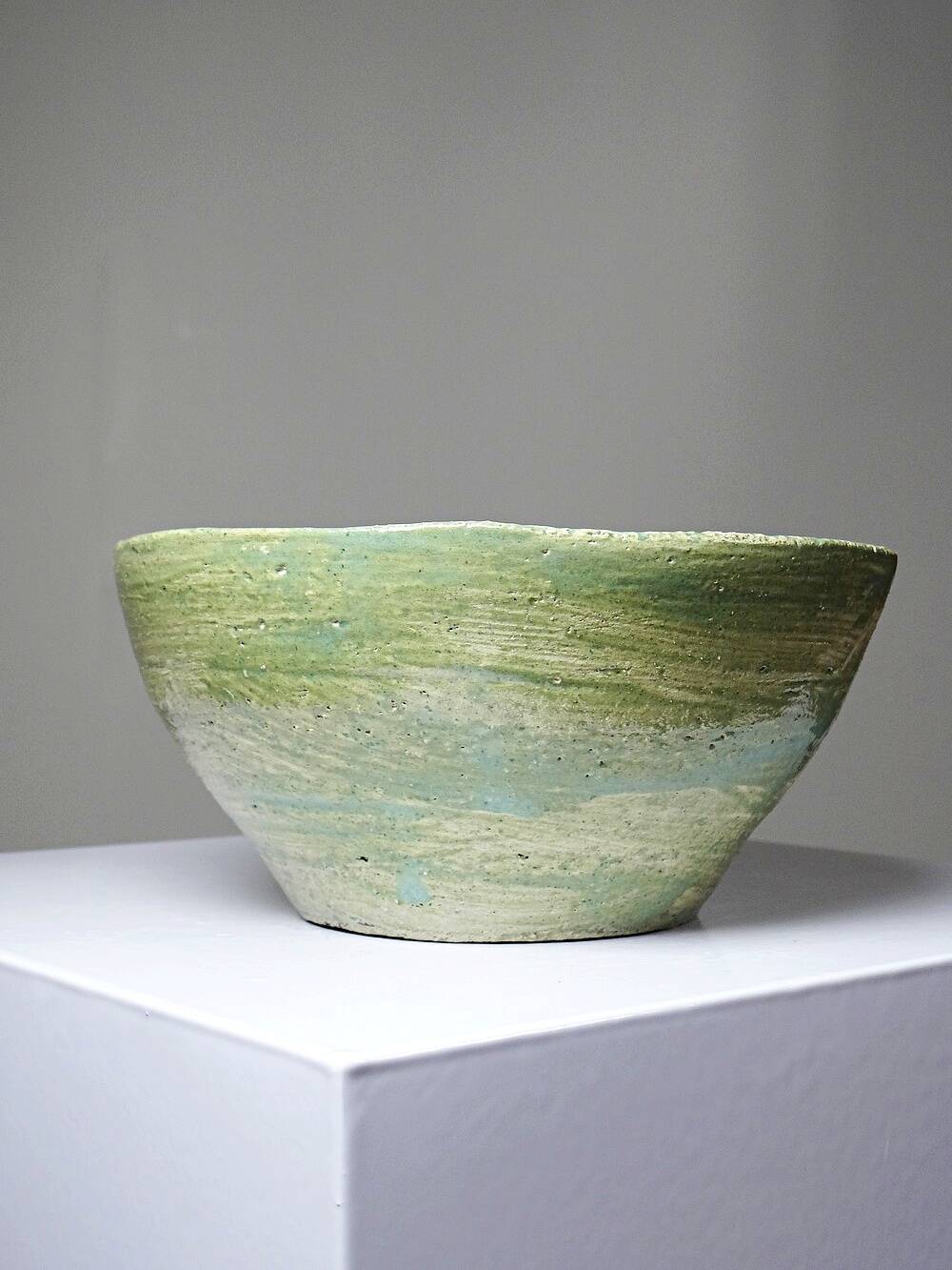 Wabi-Sabi handcrafted ceramic bowl in celadon green, 20th-19th century.