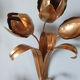 Gold sconces with floral decoration