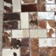 Patchwork carpet in cowhide 164x105cm from the 70s