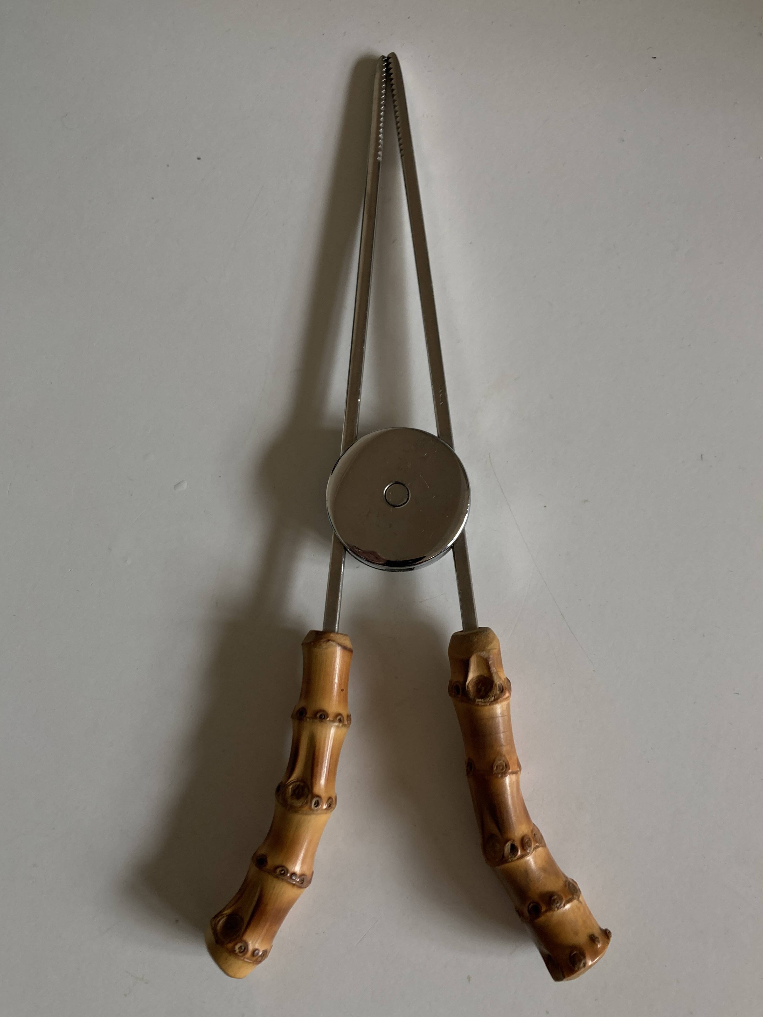 1960 dlg Adnet steel and bamboo ice tongs