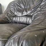 Pair of black leather armchairs from the 80s