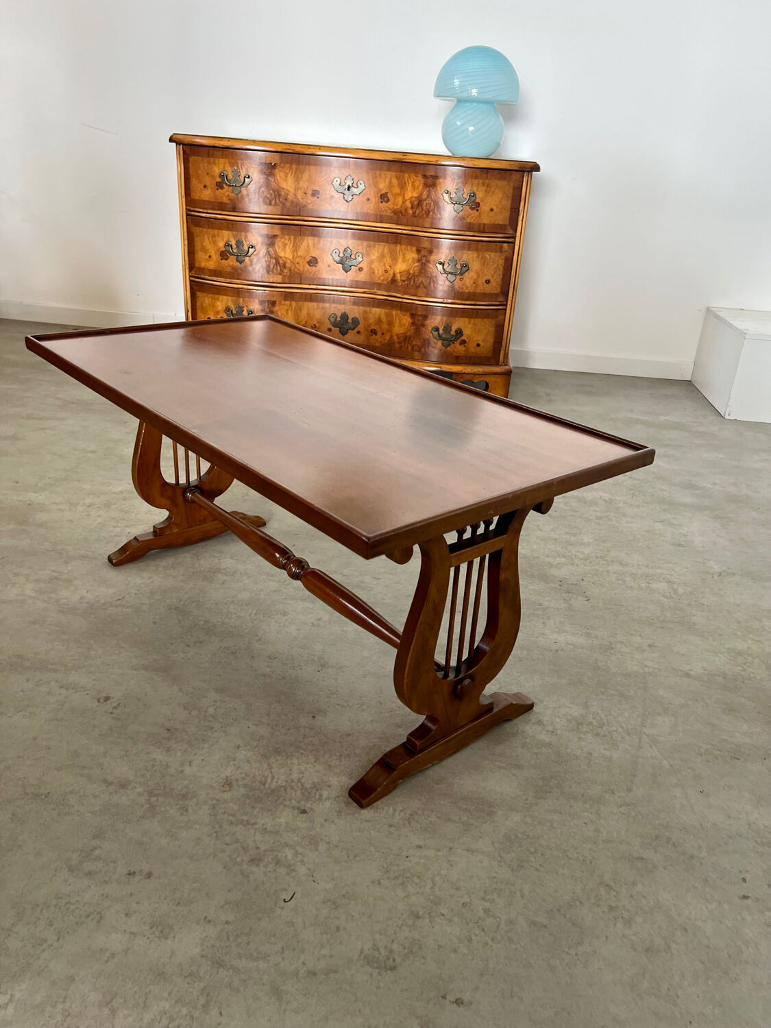 Old rectangular wood coffee table with lyre side posts