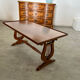 Old rectangular wood coffee table with lyre side posts