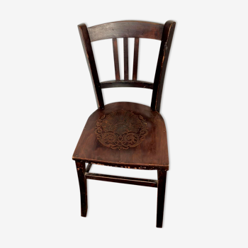 Antique bistro chair with pattern