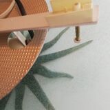 White opaque glass ceiling light and golden metal sun