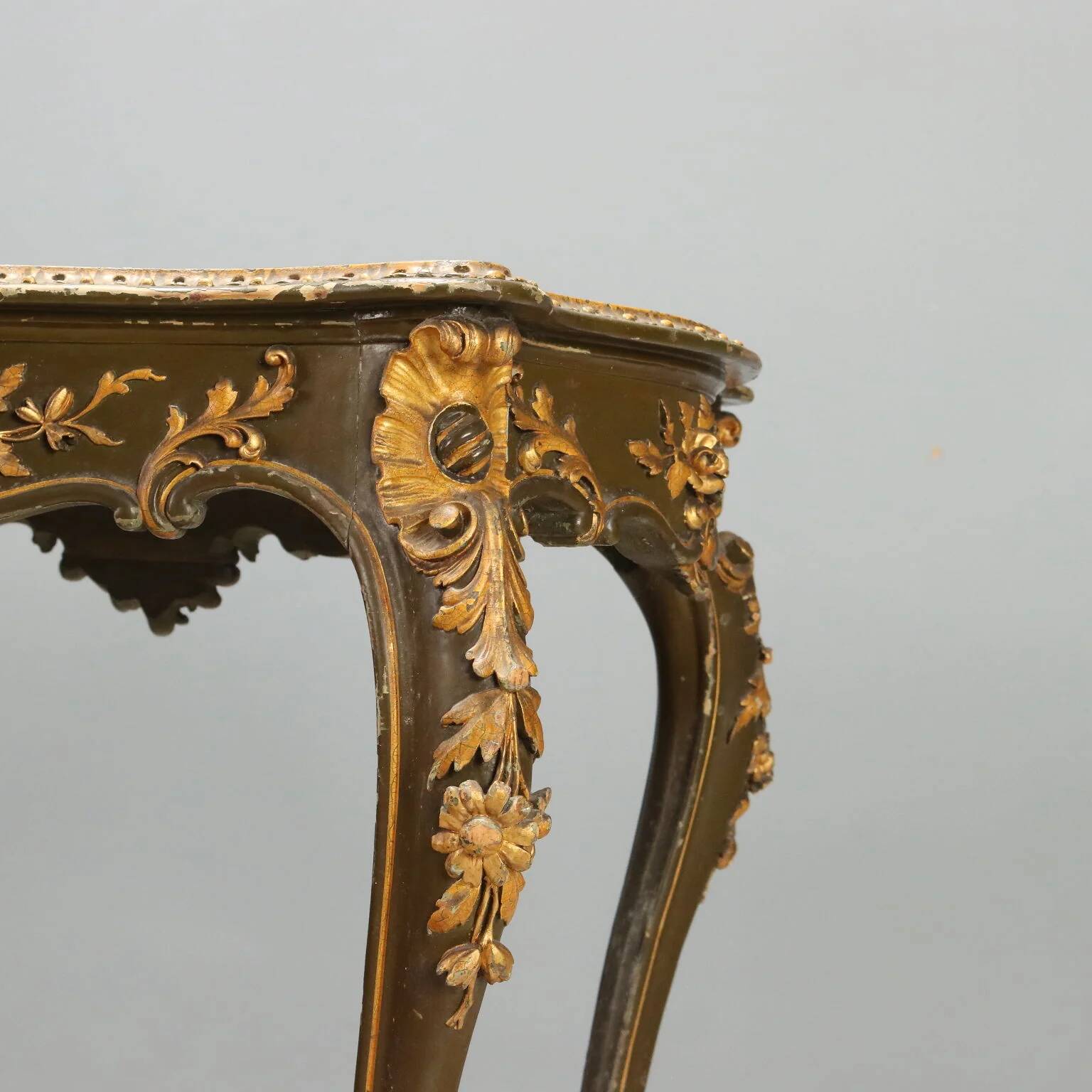Baroque-style table in carved wood