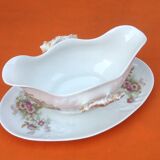 Sauce boat on dormant white porcelain, floral decoration