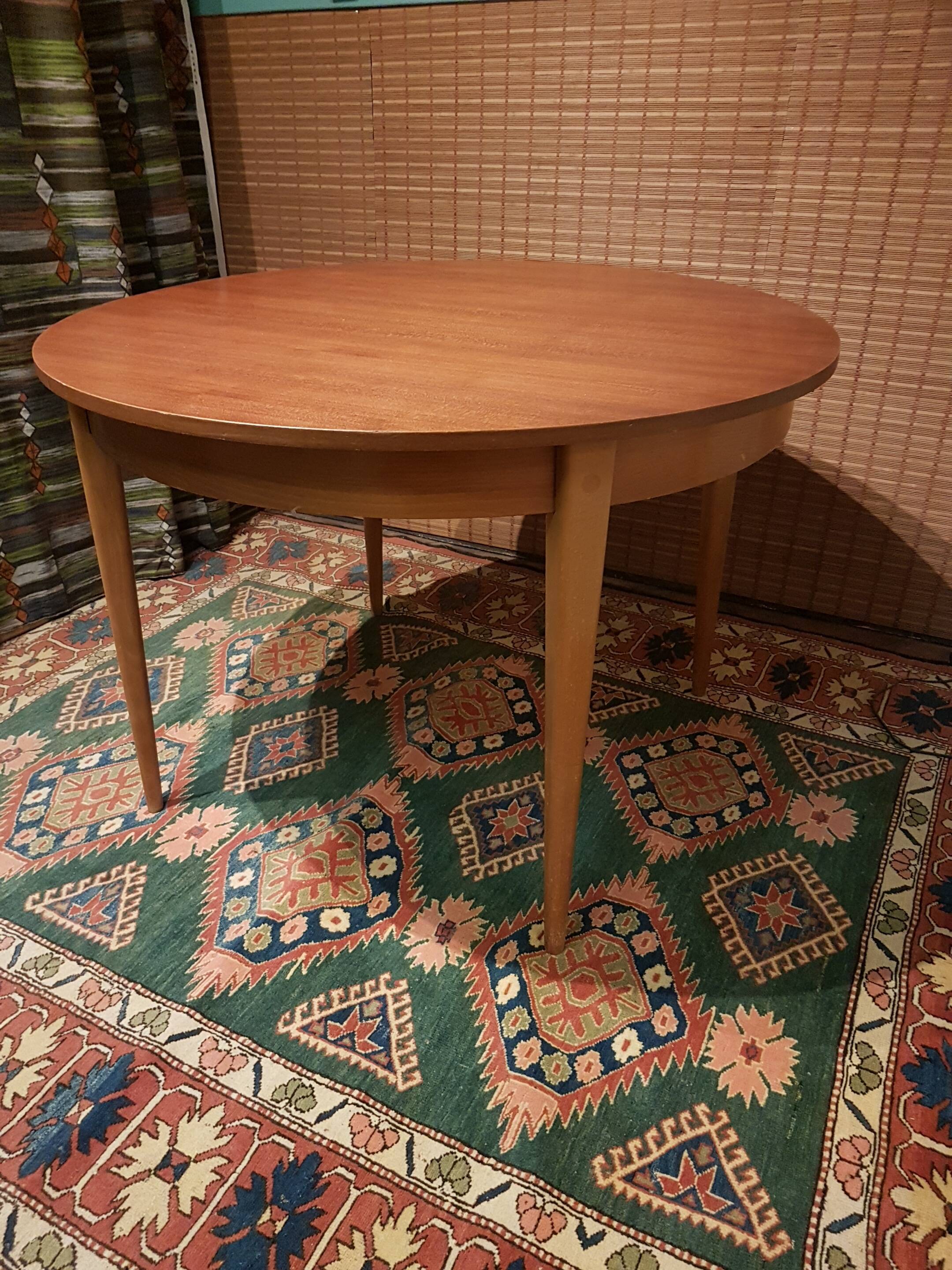 Scandinavian round extending table.