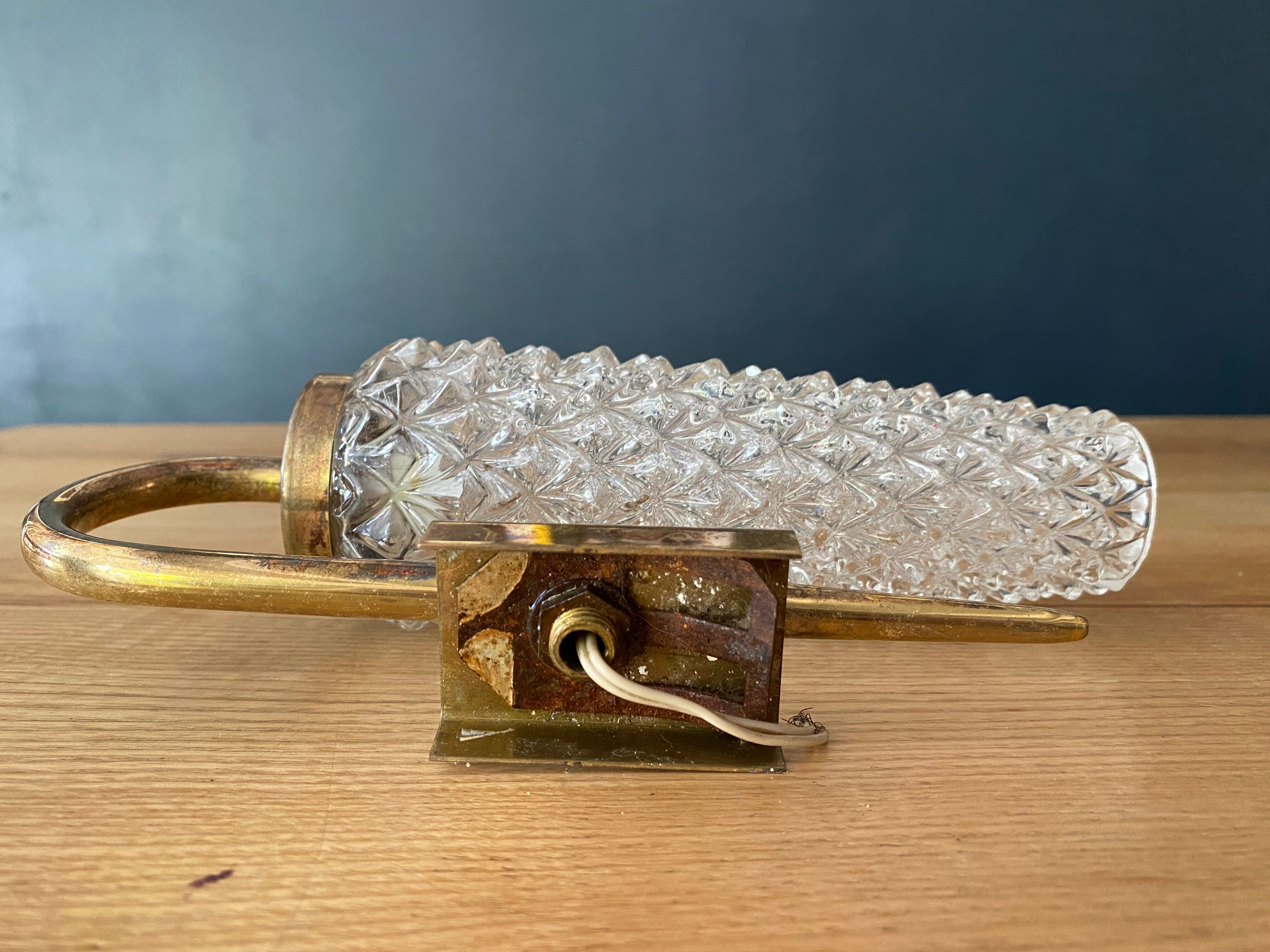 Brass and chiseled glass wall light