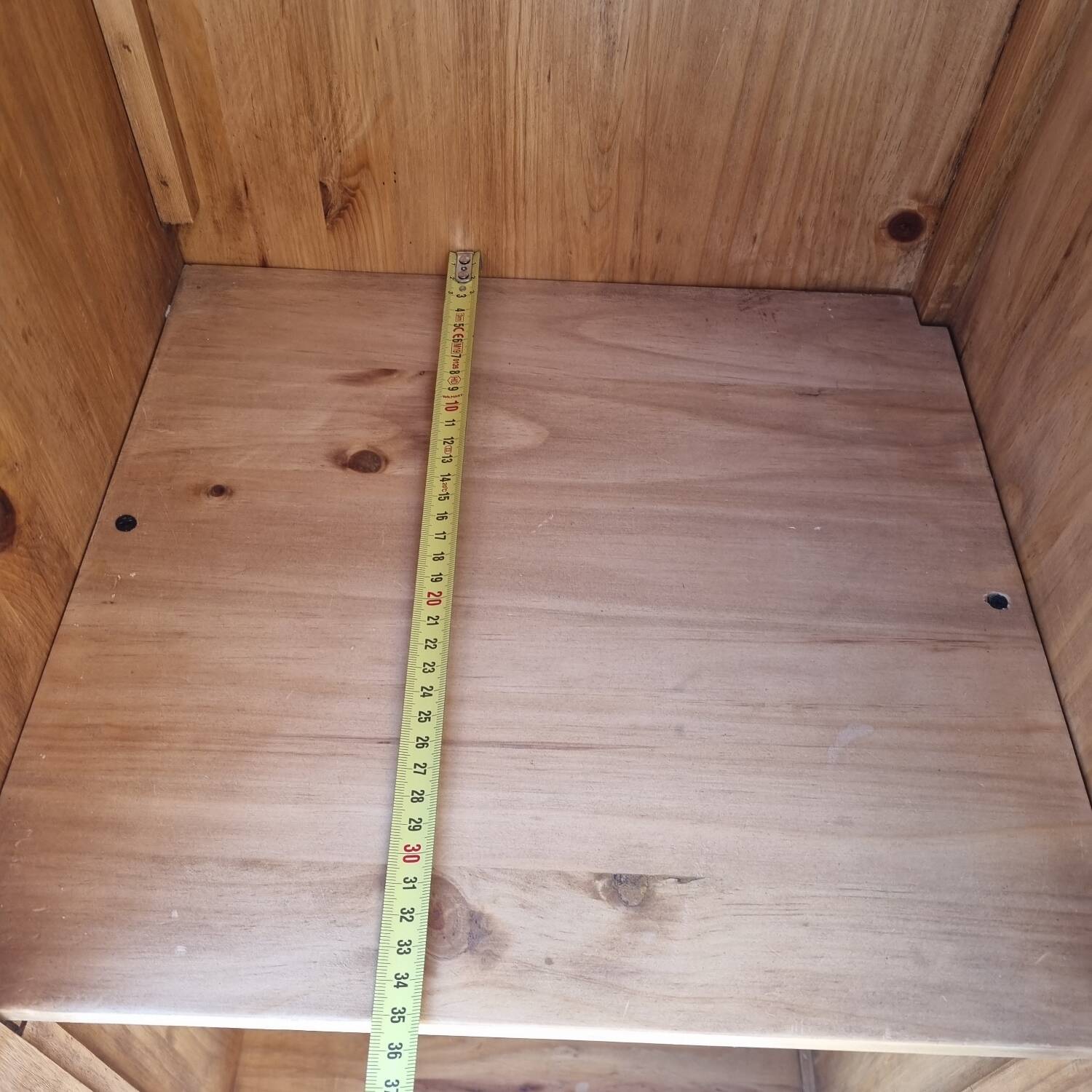 Grain merchant-style furniture with 6 drawers and a cupboard.