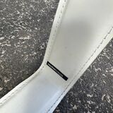 Round coffee table with a metal/leather frame and glass top by Roche Bobois.