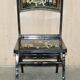 Pair of military folding chairs with Indian decoration.