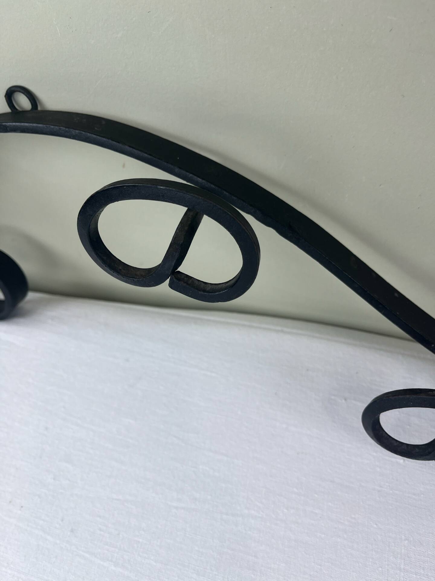 Wrought iron coat rack
