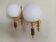 Pair of golden brass wall lights and opaline.