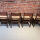 Set of four wooden and leather chairs from Maison Regain