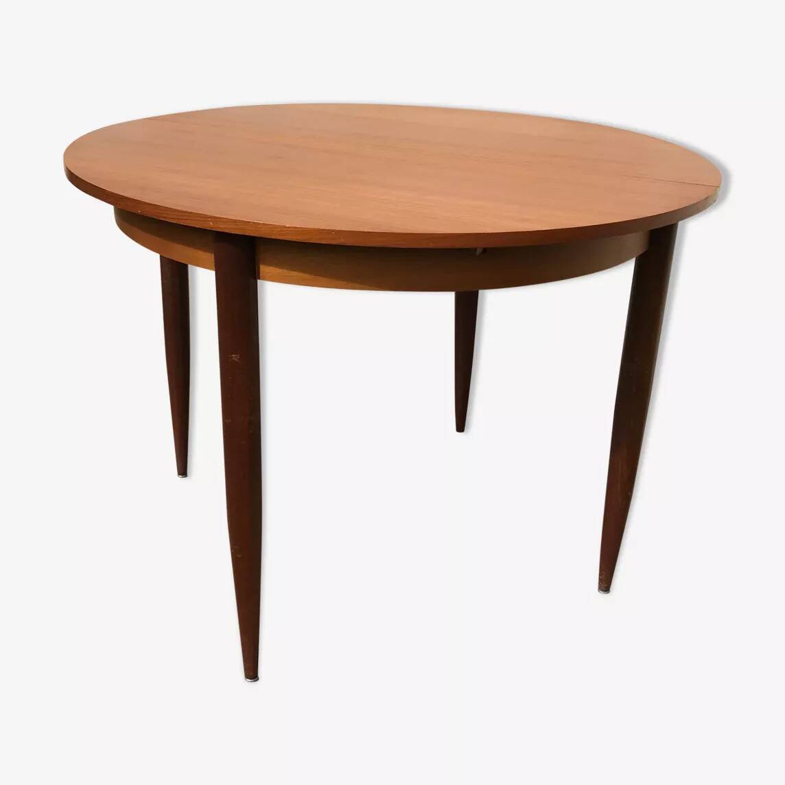 Vintage 1970s round table with extensions.