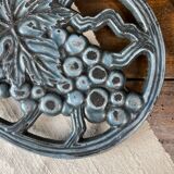 Oval enamelled cast iron trivet