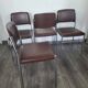 Lot de 4 chaises fauteuil en skaï marron année 1970