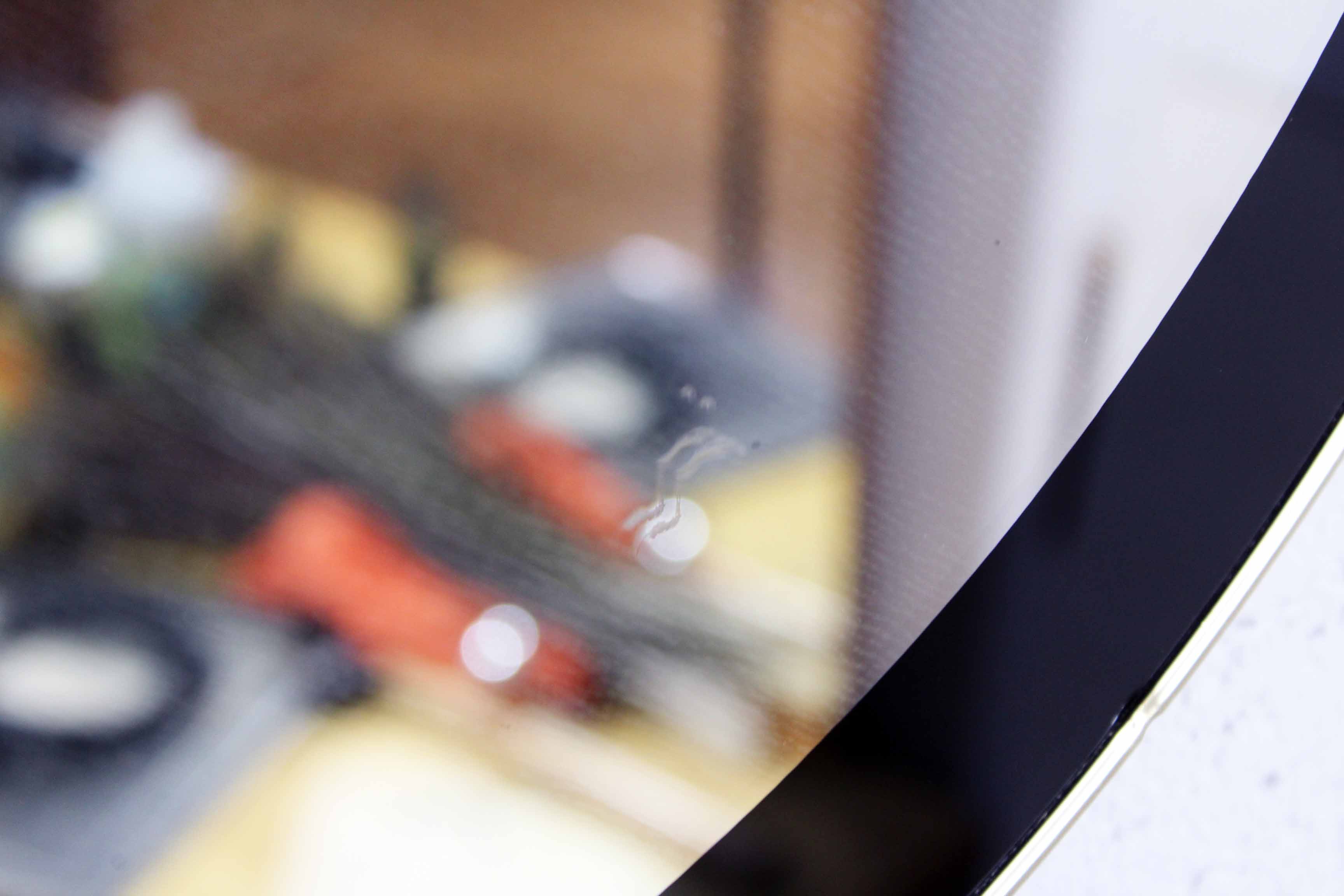 Black and gold 60s round mirror