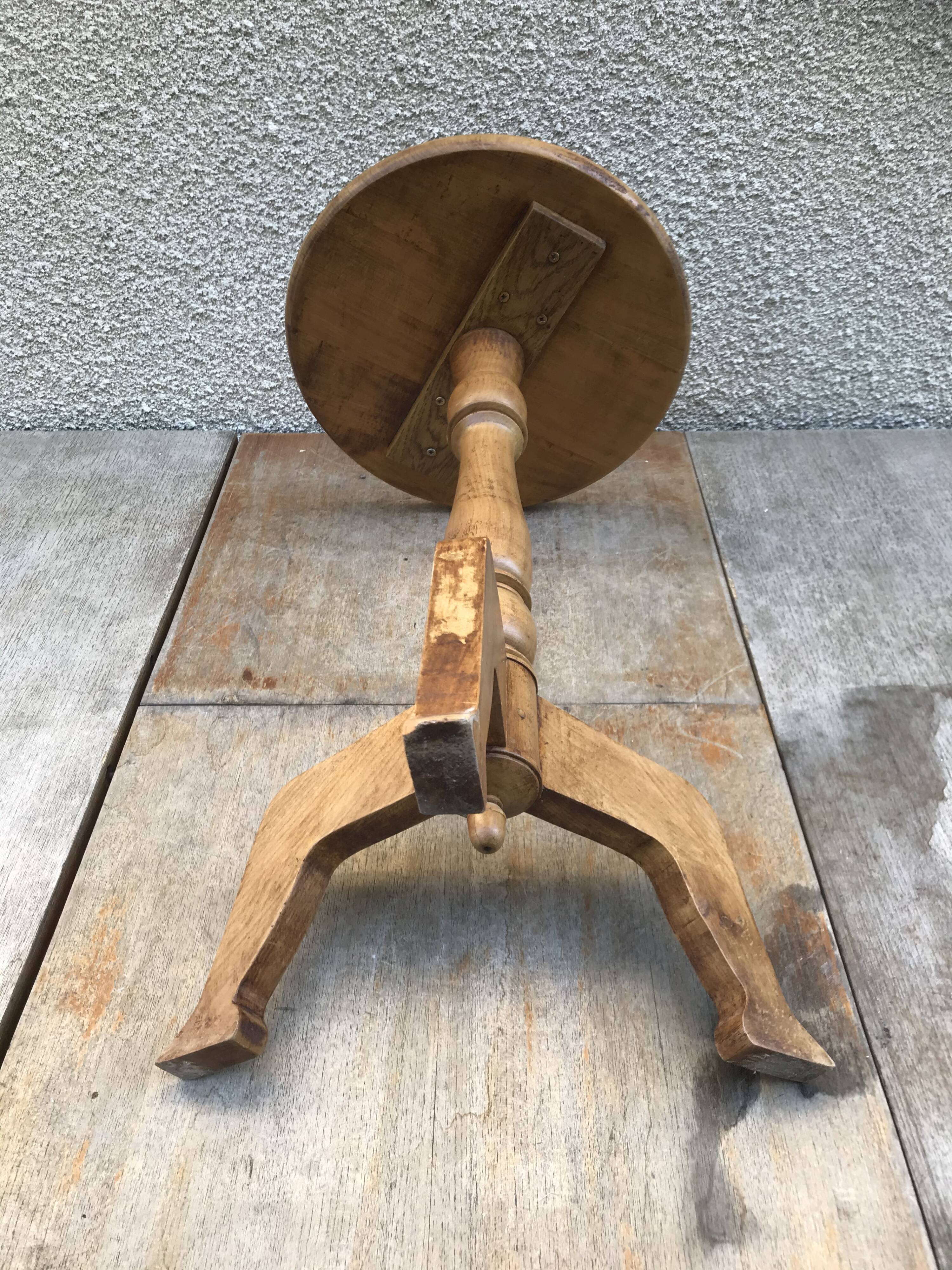 Old vintage wood tripode table