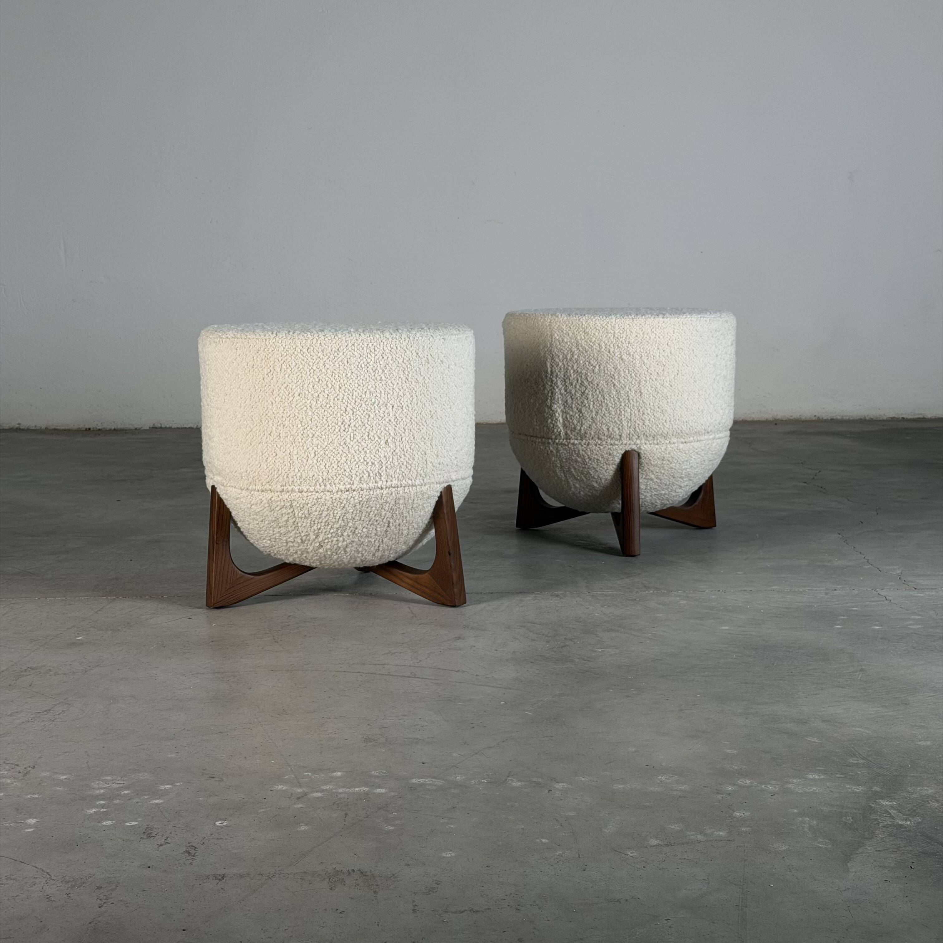 TOTEMO stools by FORME with ivory Dedar bouclé upholstery and walnut legs.