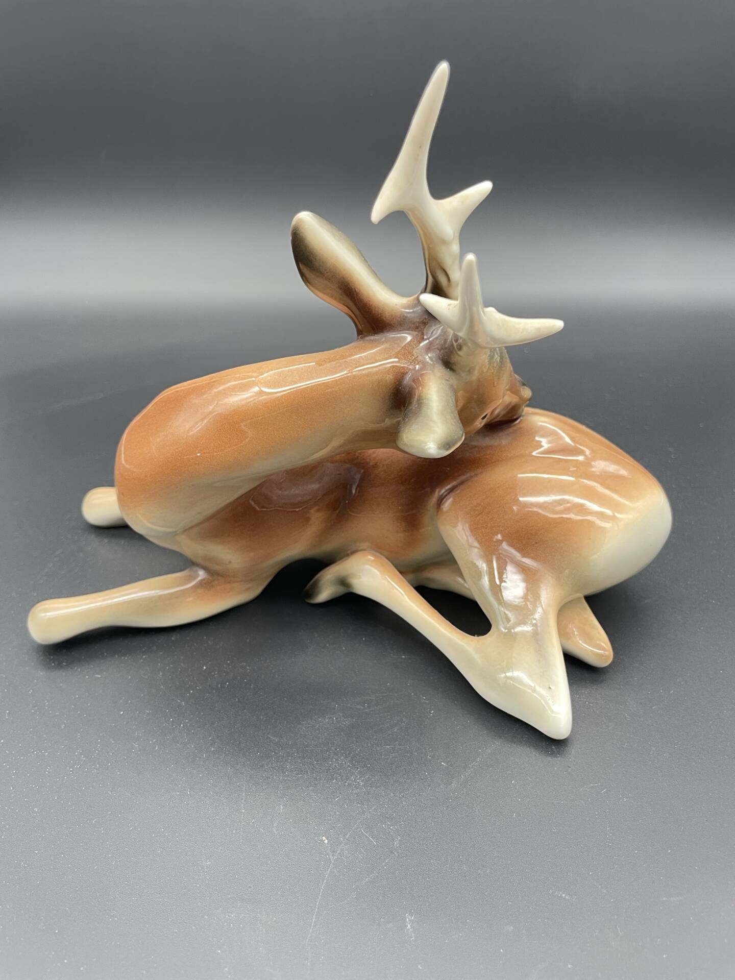 Royal Dux porcelain lying deer – Vintage Bohemian sculpture, mod