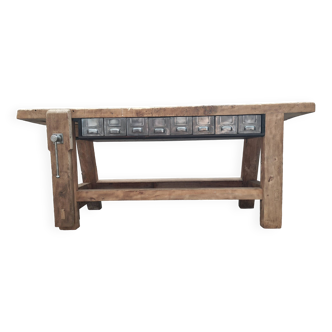 Old carpenter's workbench with eight metal drawers, industrial console