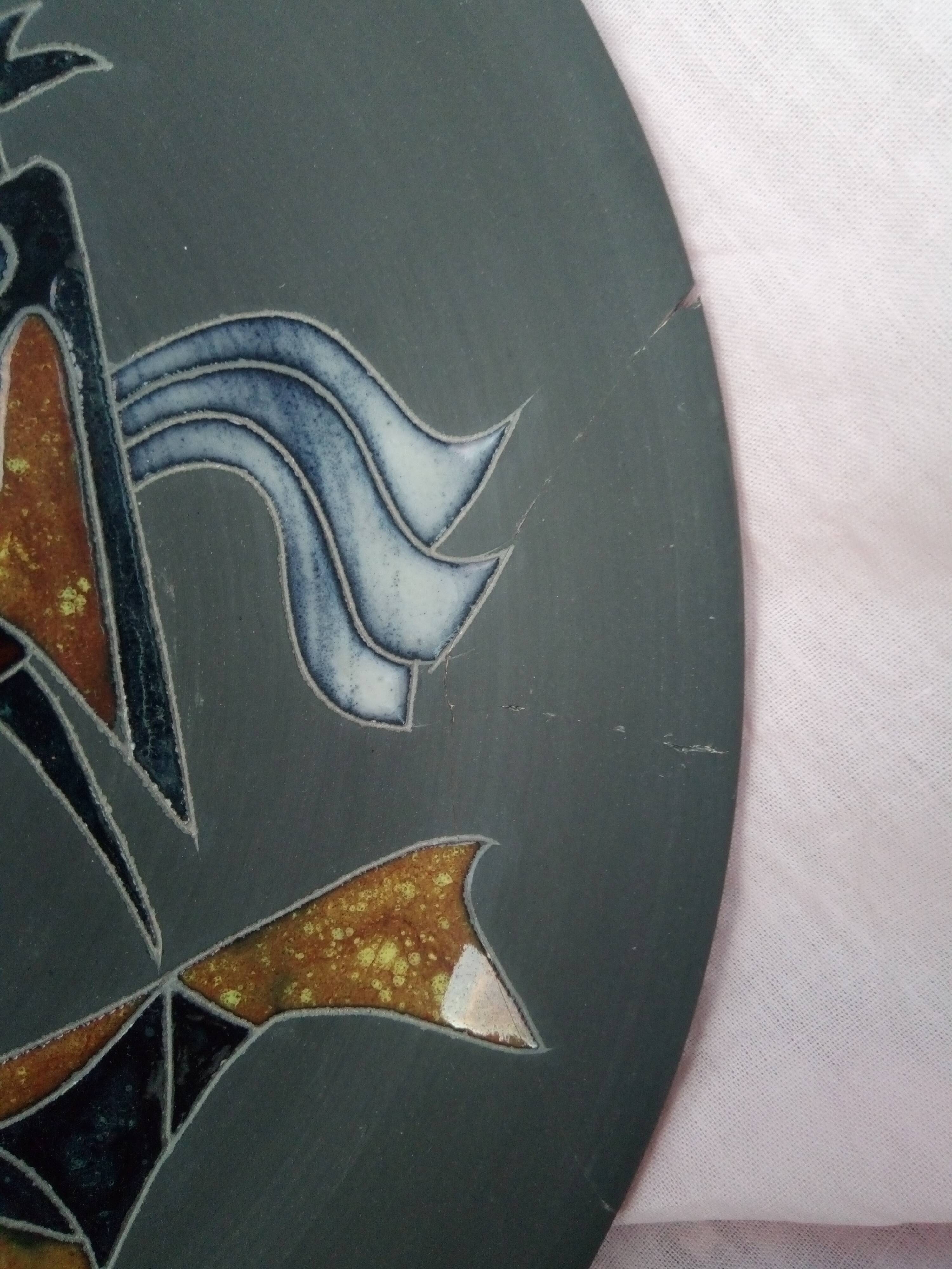 Rare pair of ceramic plates and enamel with mythological decoration. The 50s.