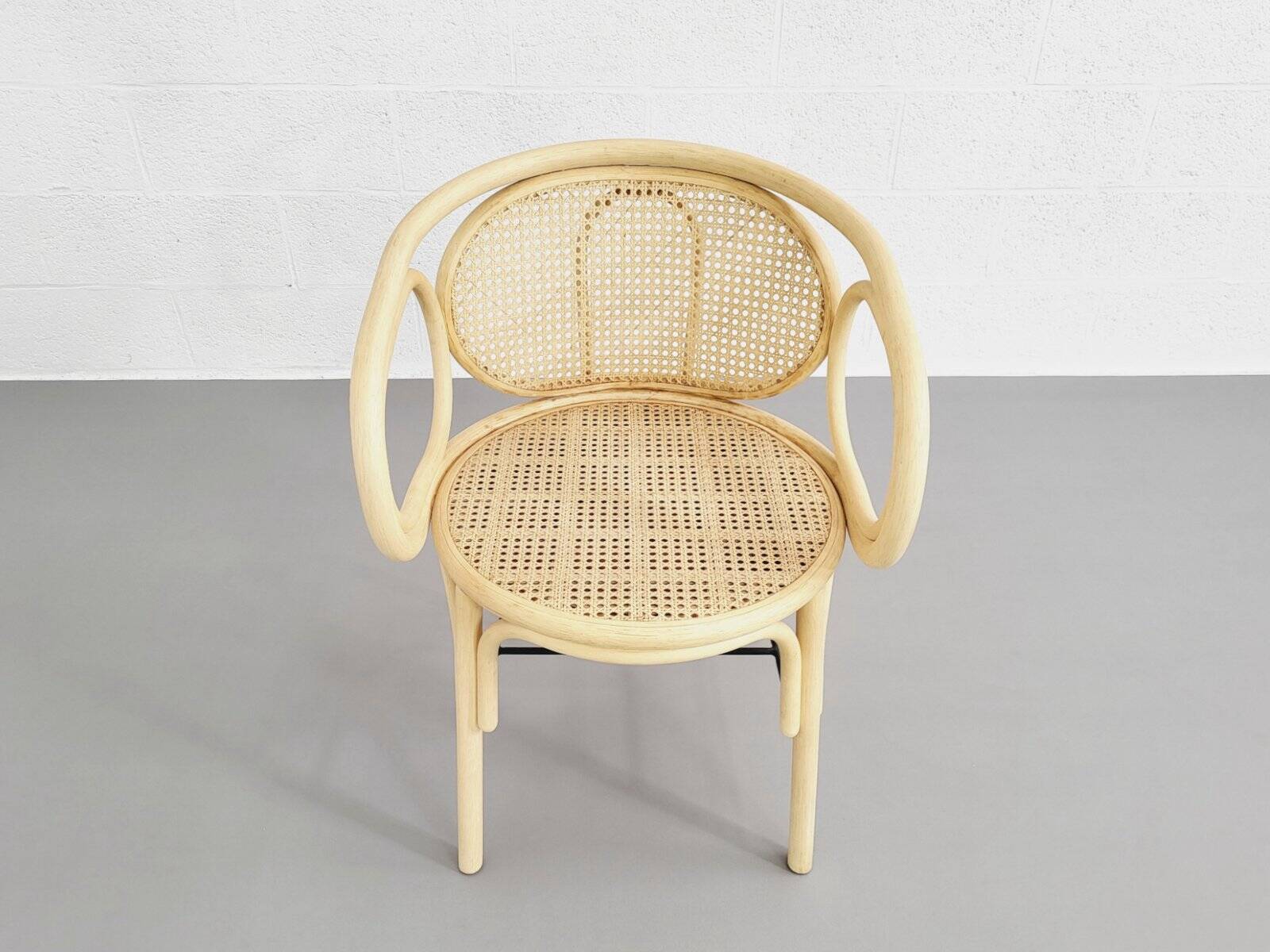 Paire de fauteuils en rotin et cannage