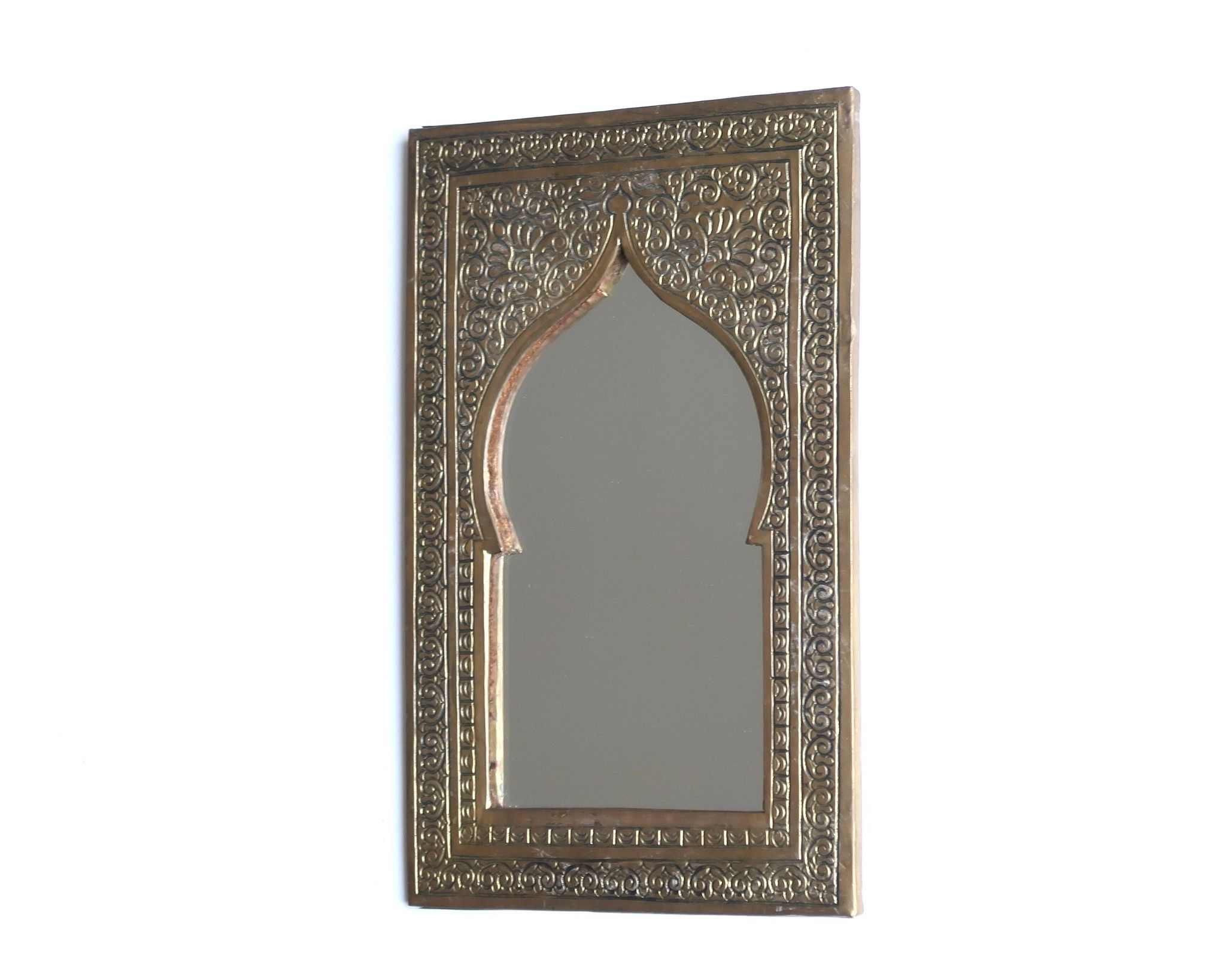 Rectangular Moroccan mirror in brass resembling a door, 1970s.
