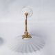 vintage wall lights in brass and pleated opal glass