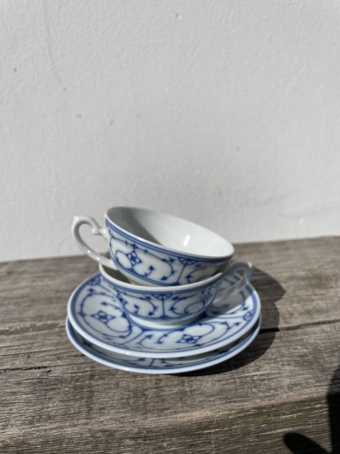 Pair of signed blue porcelain cups