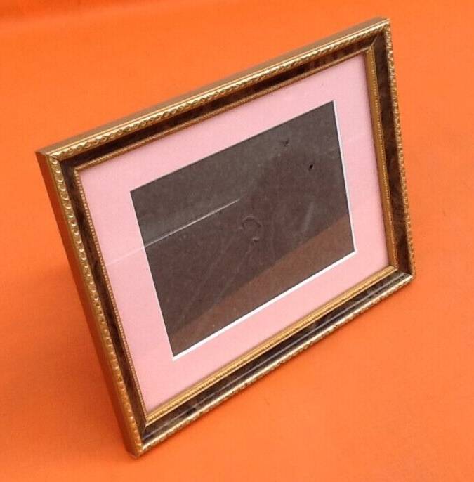 Wooden frame with gilding