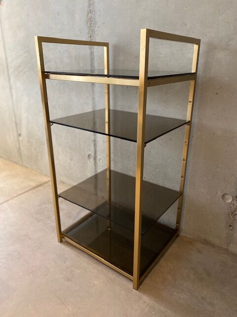Golden brass and glass shelves