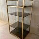 Golden brass and glass shelves
