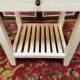 Wooden bedside table painted white