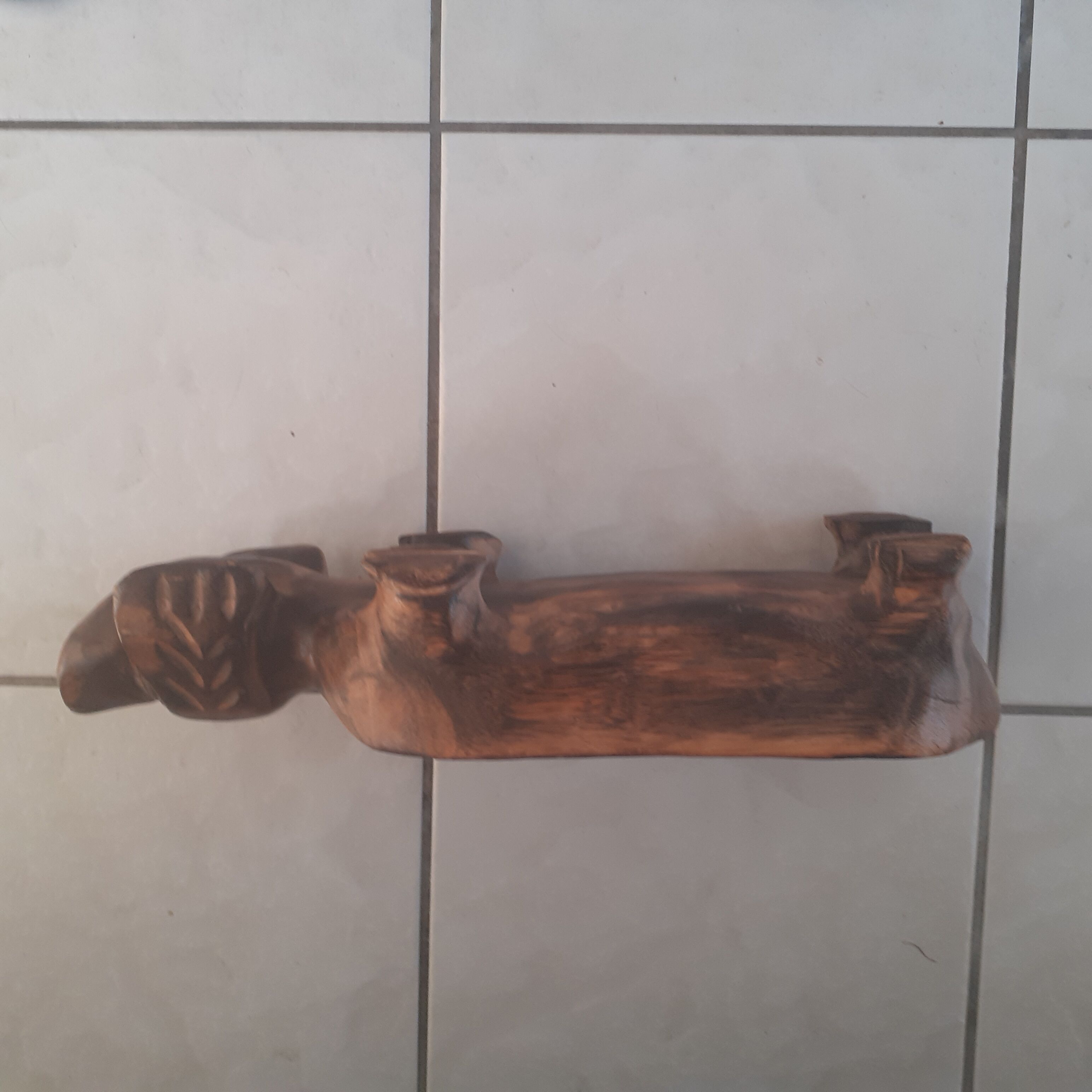 Foot rest in solid wood, dog form