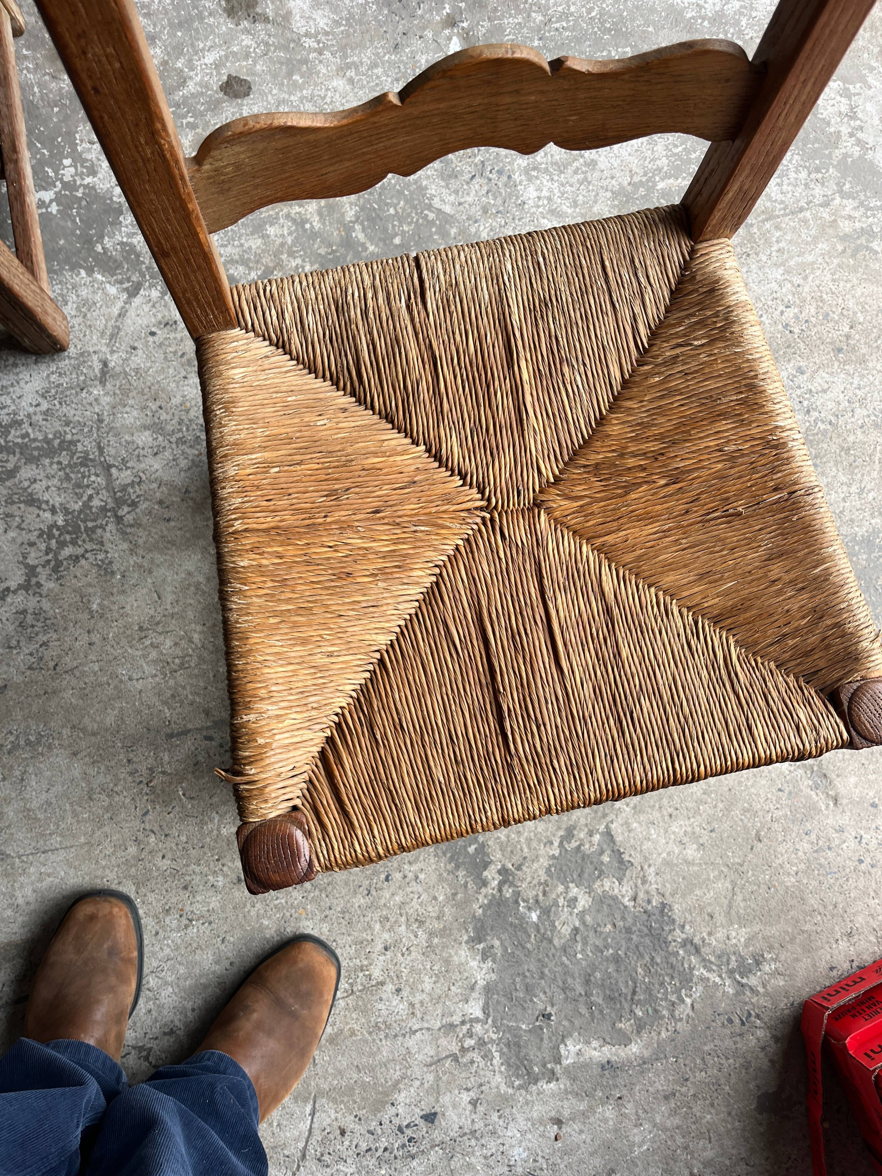 Set of 6 sculpted oak chairs with straw seats – 1950s