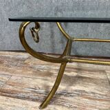 Coffee table in gilded brass and glass